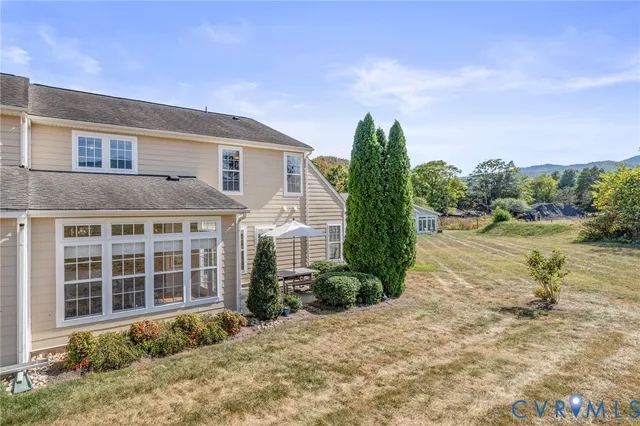 a house view with a garden space
