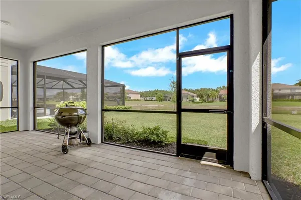 a view of a room with a large window