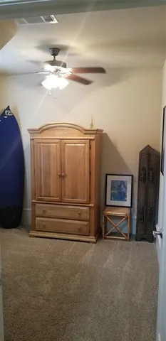 a view of a livingroom with furniture and chandelier