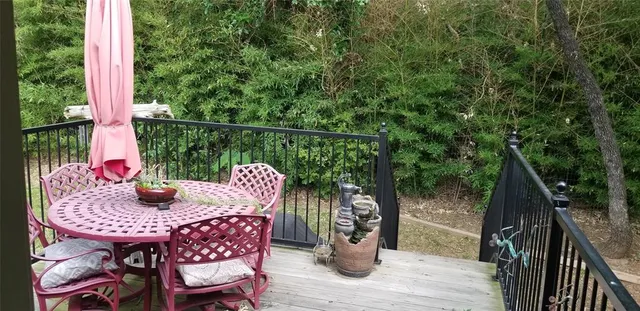 a view of balcony with furniture and outdoor seating