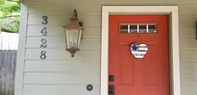 a front view of a house with a door
