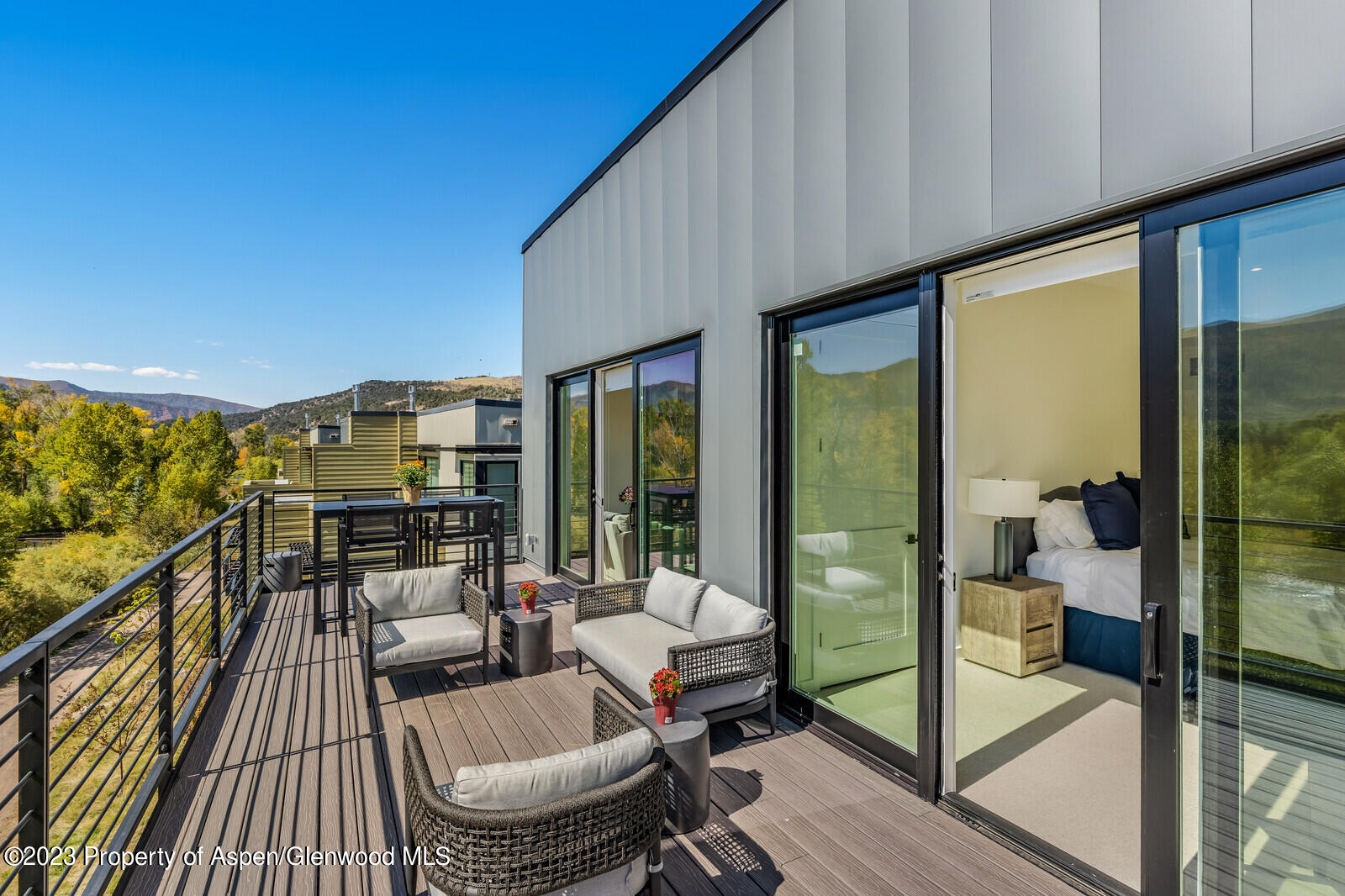 22860 2 Rivers Road, Unit 370 Basalt, CO 81621 - Photo 17 of 27 a balcony with chairs