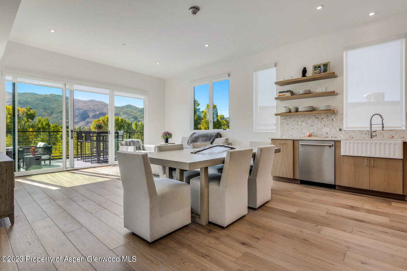 22860 2 Rivers Road, Unit 370 Basalt, CO 81621 - Photo 2 of 27 a kitchen with a sink stove and cabinets