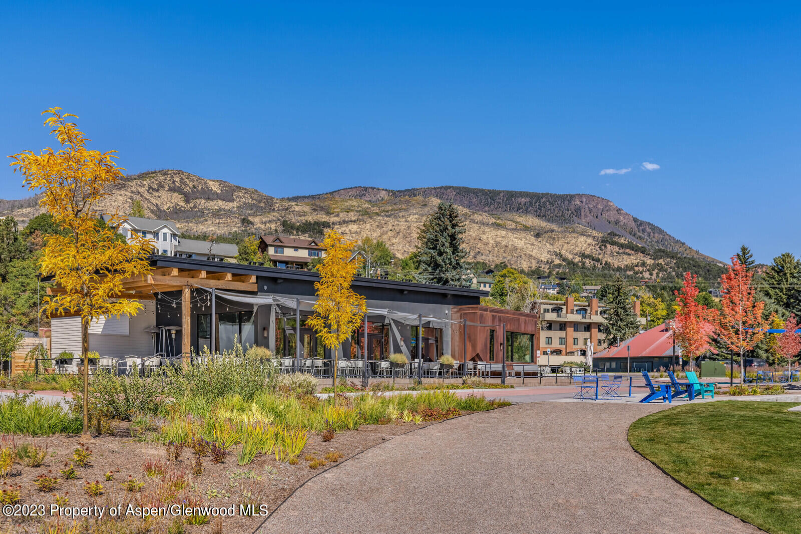 22860 2 Rivers Road, Unit 370 Basalt, CO 81621 - Photo 24 of 27 a front view of a house with a yard and lake view