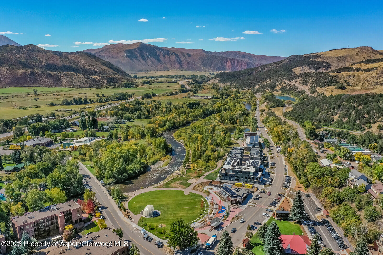22860 2 Rivers Road, Unit 370 Basalt, CO 81621 - Photo 26 of 27 a view of a lush green field with mountains in the background