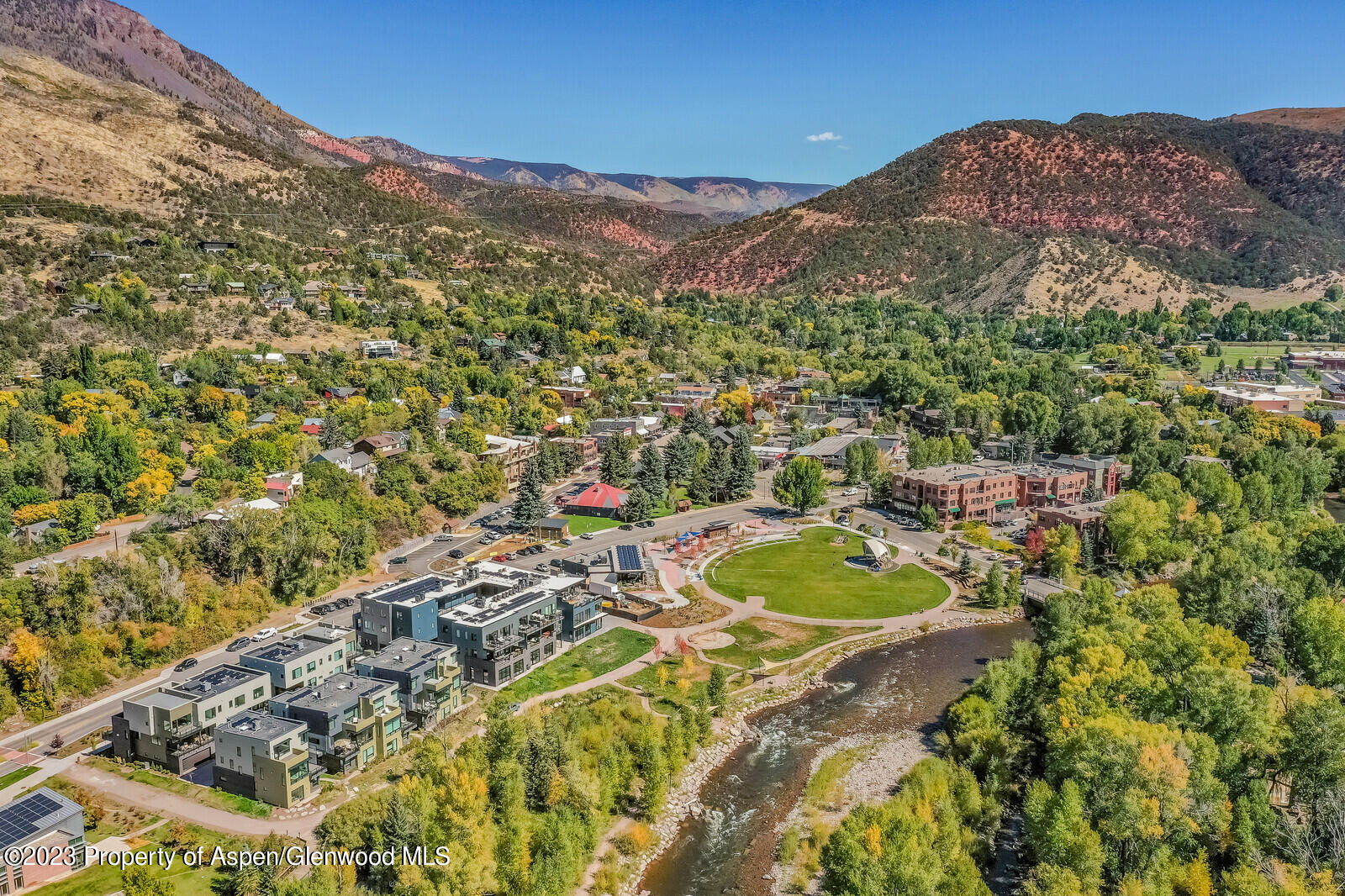 22860 2 Rivers Road, Unit 370 Basalt, CO 81621 - Photo 27 of 27 a view of a backyard with a table and chairs