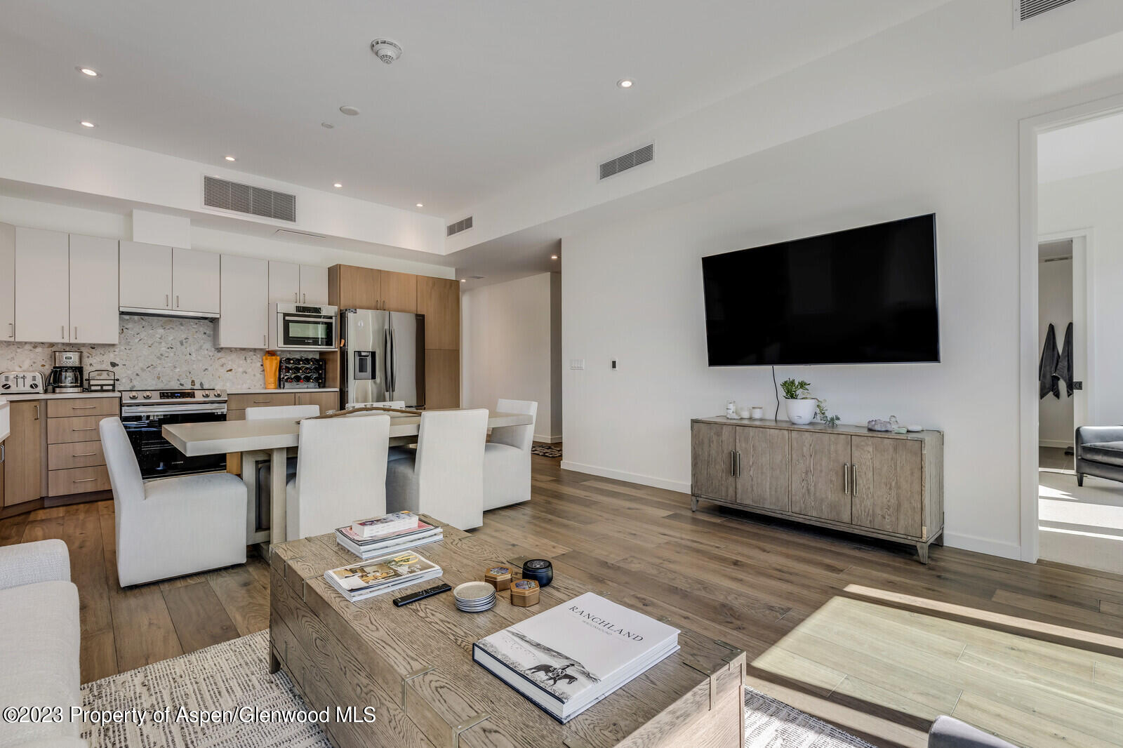 22860 2 Rivers Road, Unit 370 Basalt, CO 81621 - Photo 5 of 27 a living room with furniture and a flat screen tv