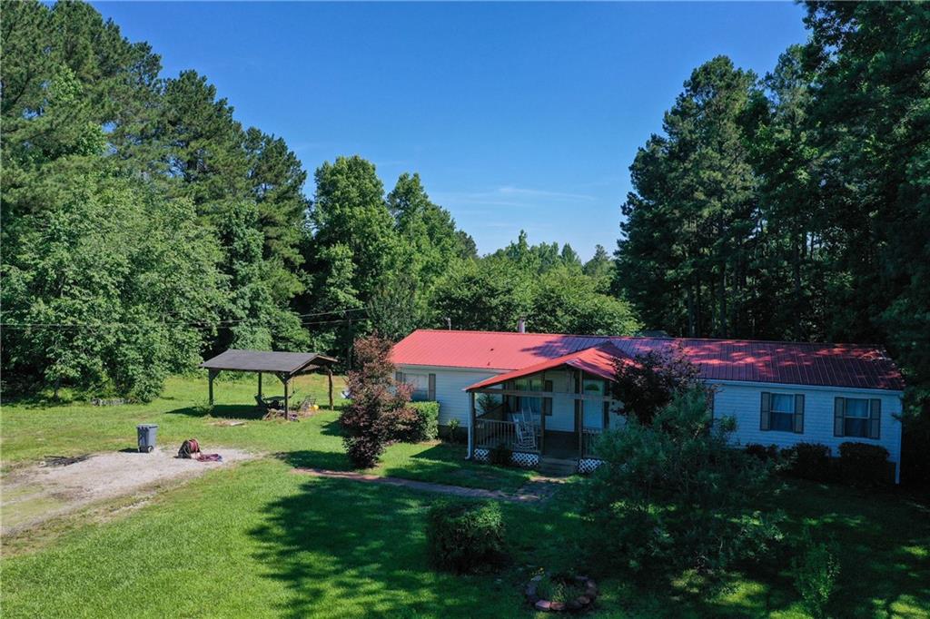 a view of a back yard of the house