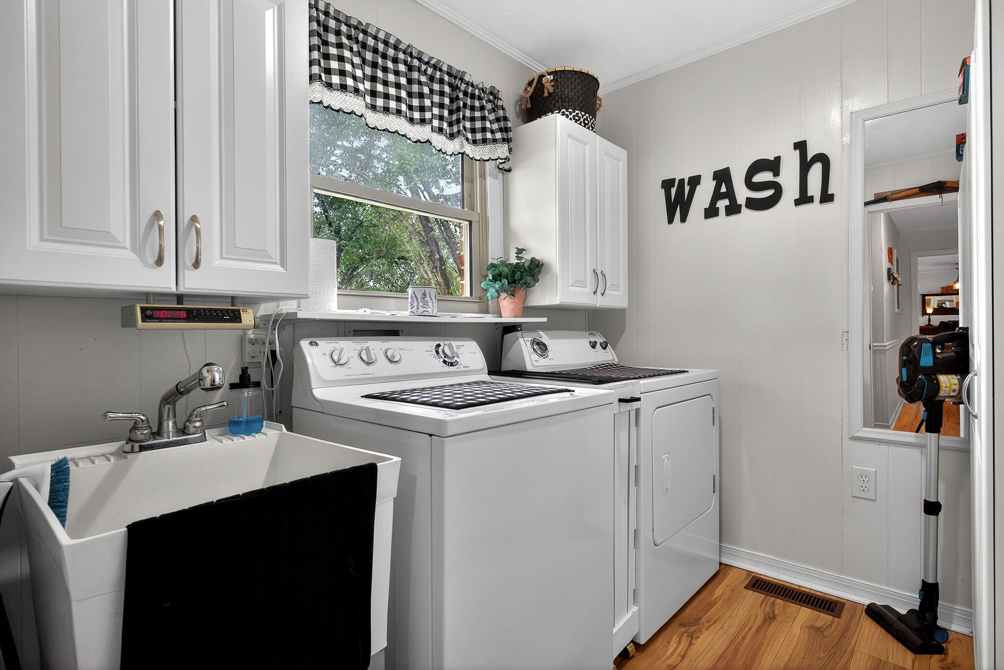 1755 Burgess Falls Road Sparta, TN 38583 - Photo 39 of 56 a utility room with sink dryer and washer