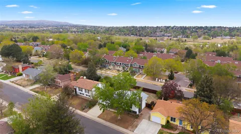 an aerial view of lake residential houses with outdoor space and swimming pool