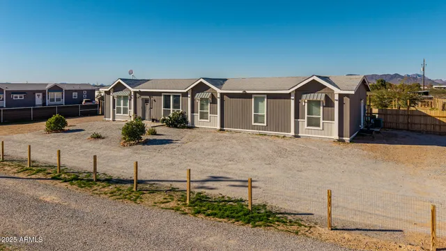 a front view of a house with swimming pool
