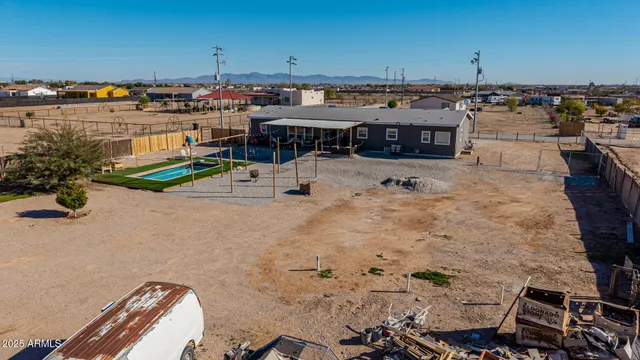 a view of a swimming pool with a patio