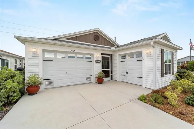 a view of a house with garage