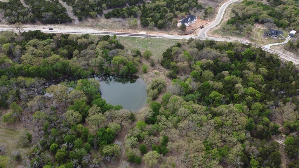 1045 Creek Crossing Road Nemo, TX 76070 - Photo 8 of 14 an aerial view of residential house with outdoor space and trees all around