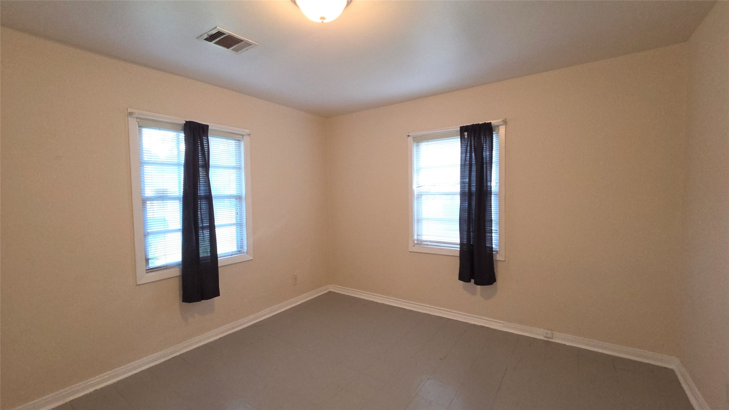 8510 Cowart Street Houston, TX 77029 - Photo 12 of 12 an empty room with windows