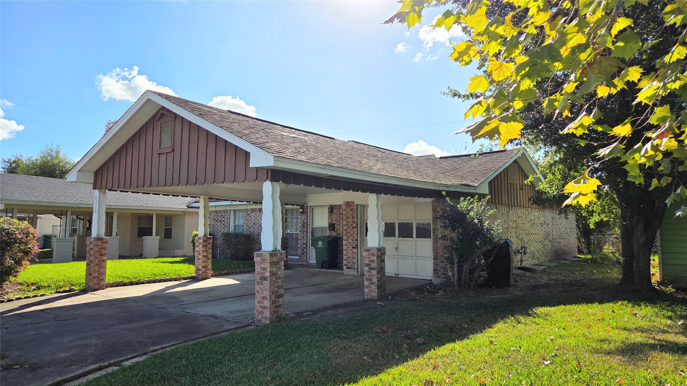 8510 Cowart Street Houston, TX 77029 - Photo 2 of 12 a view of a house with a swimming pool