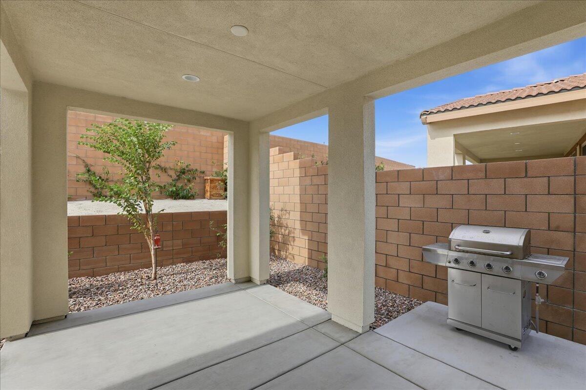 73721 Raphael Drive Palm Desert, CA 92211 - Photo 39 of 54 a kitchen with a sink and a stove top oven
