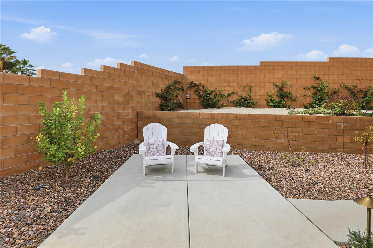 73721 Raphael Drive Palm Desert, CA 92211 - Photo 40 of 54 a view of roof with sitting area