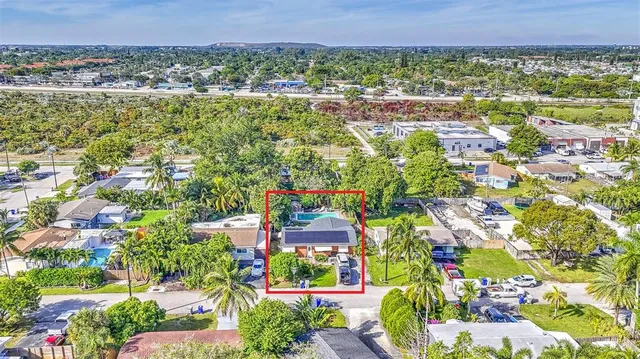 front view of a house with a garden