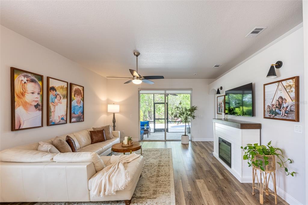 4136 Little Gap Loop Ellenton, FL 34222 - Photo 23 of 50 a living room with furniture and a large window