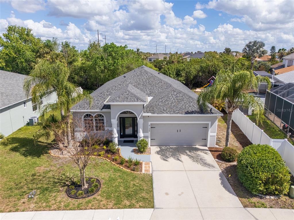 4136 Little Gap Loop Ellenton, FL 34222 - Photo 37 of 50 a aerial view of a house with table and chairs