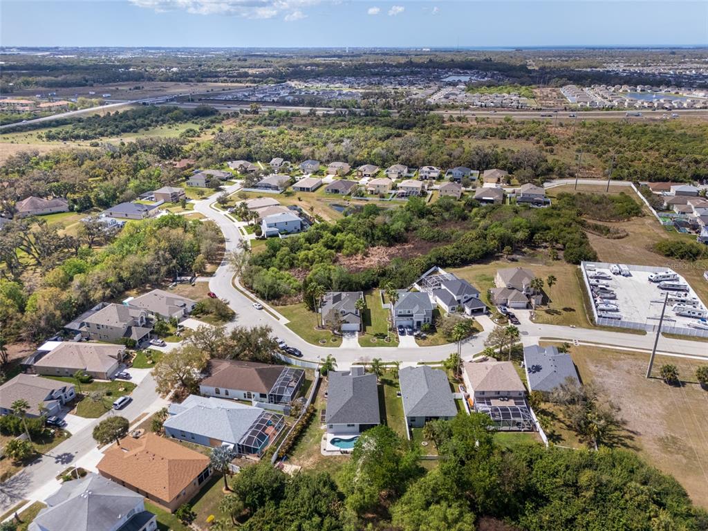 4136 Little Gap Loop Ellenton, FL 34222 - Photo 41 of 50 an aerial view of residential houses with outdoor space