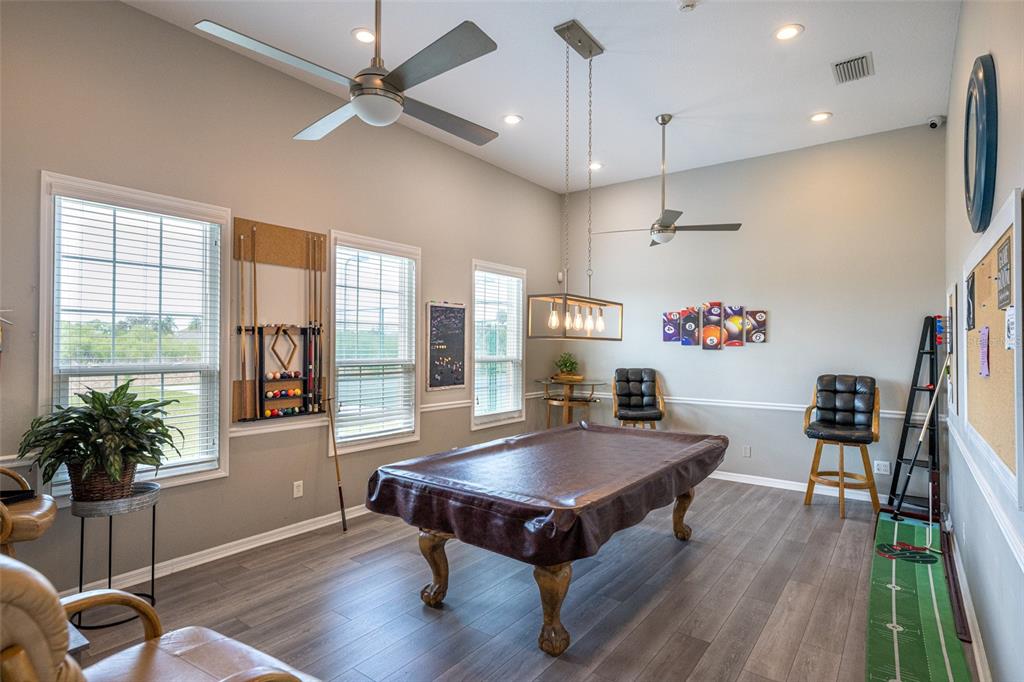 4136 Little Gap Loop Ellenton, FL 34222 - Photo 44 of 50 a living room with furniture and a table