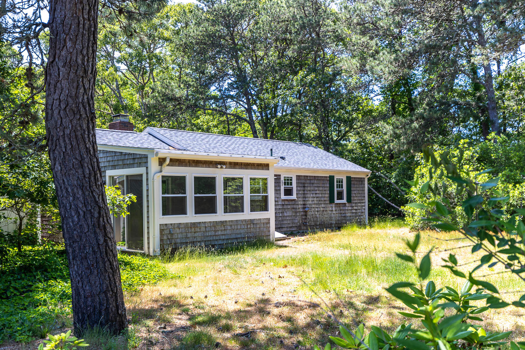 98 Long Road Harwich, MA 02645 - Photo 22 of 31 a view of a house with a yard