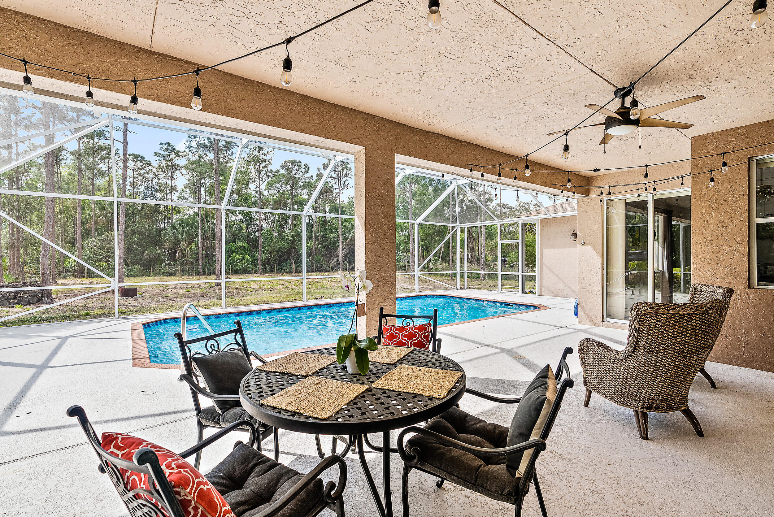 10736 157th Street North Jupiter, FL 33478 - Photo 30 of 42 Screened Patio