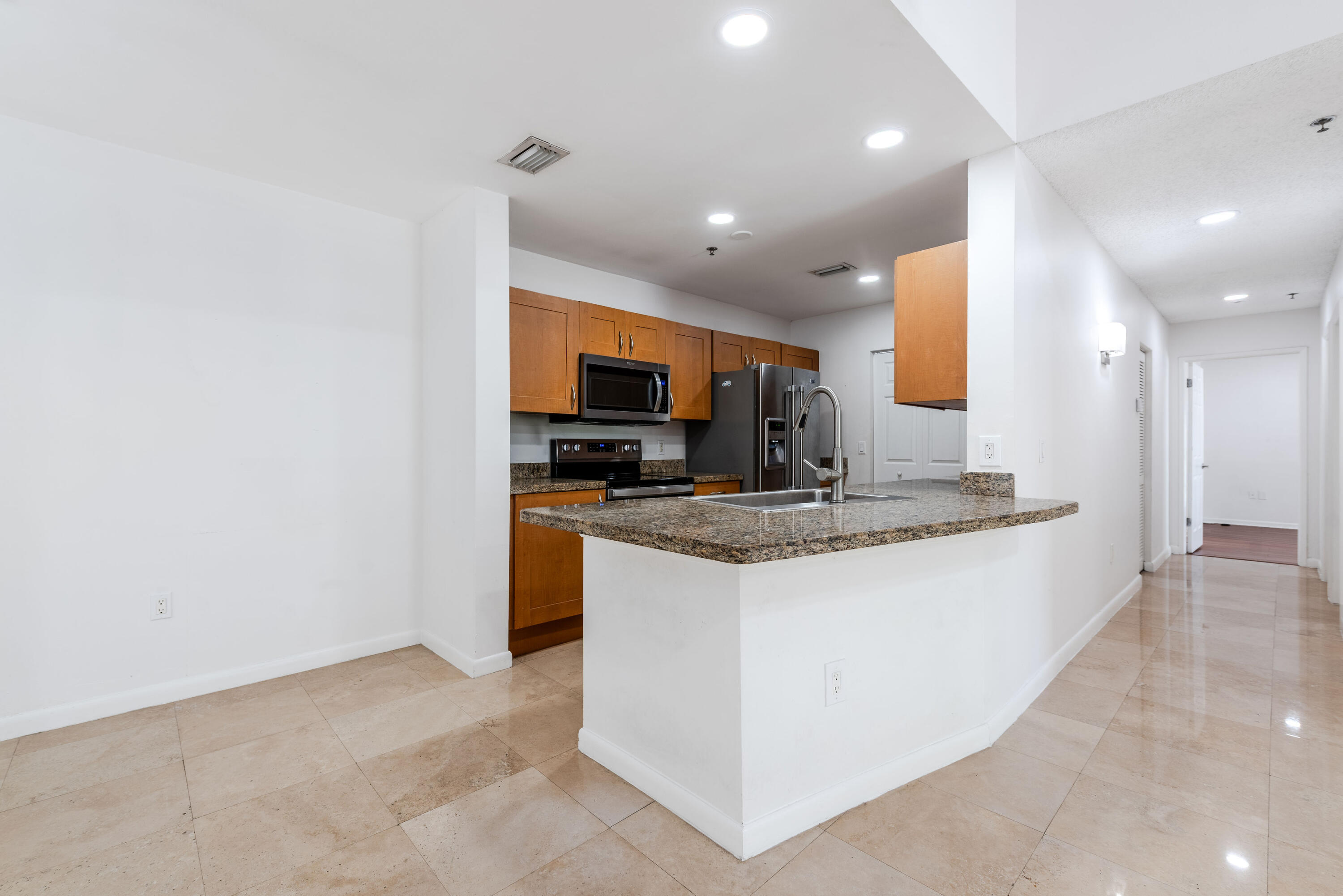 3153 Clint Moore Road, Unit 201 Boca Raton, FL 33496 - Photo 8 of 41 Dinning & Kitchen Island