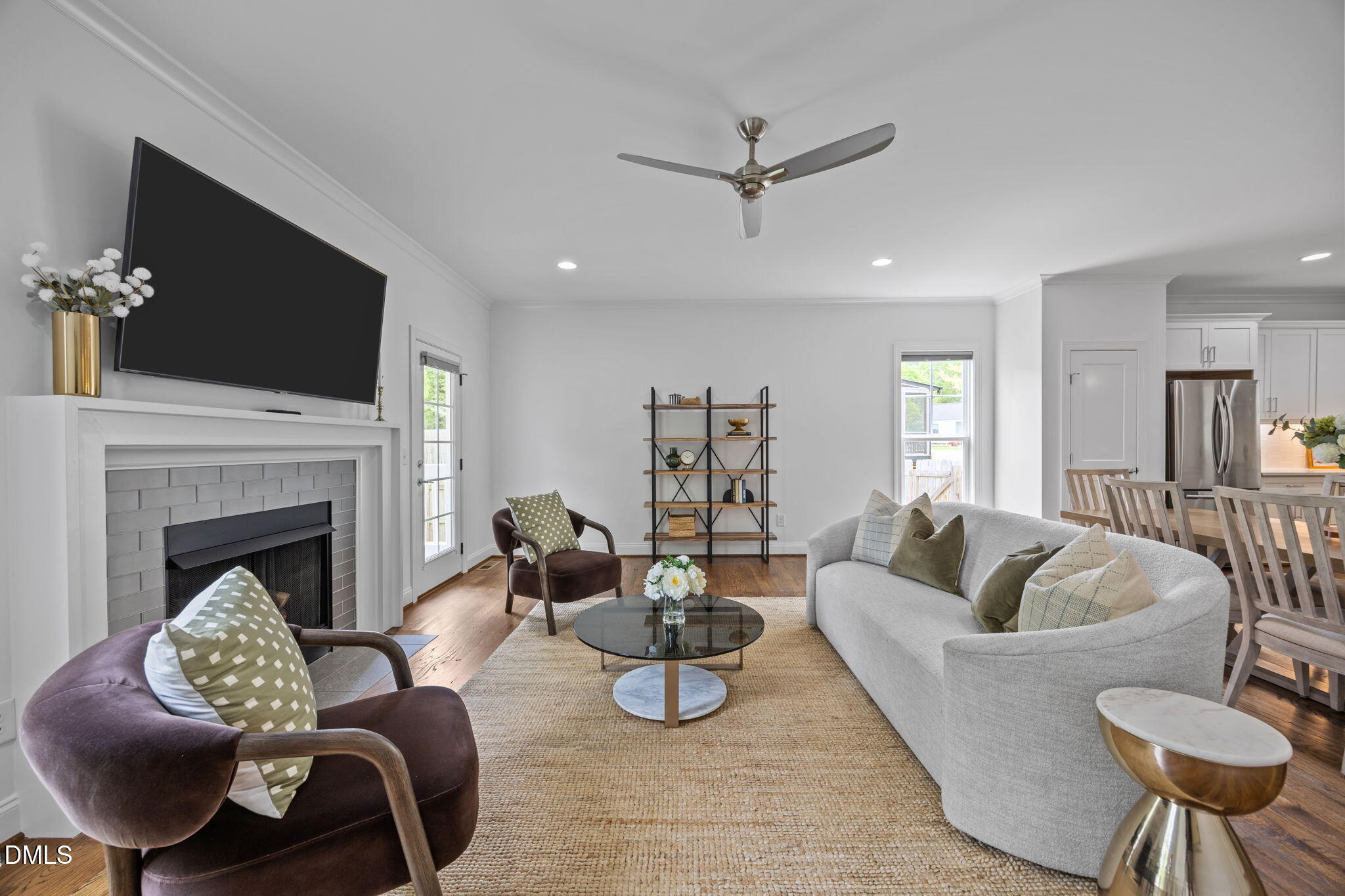 804 Hartford Road Raleigh, NC 27610 - Photo 7 of 26 a living room with furniture fireplace and window