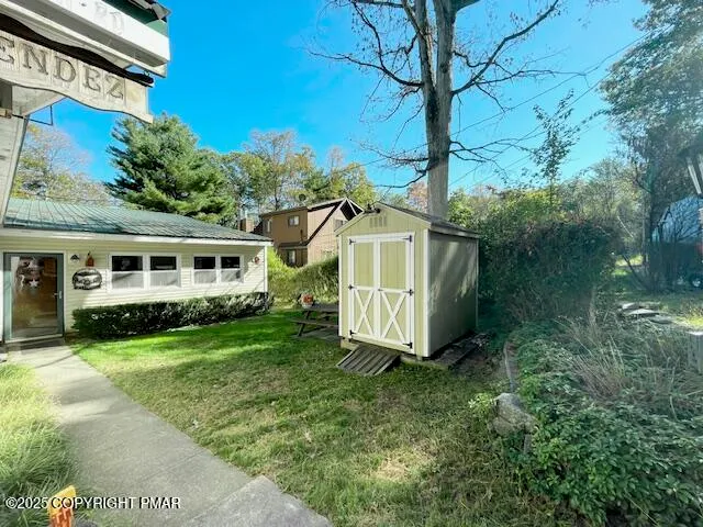 a swimming pool with trees in the background