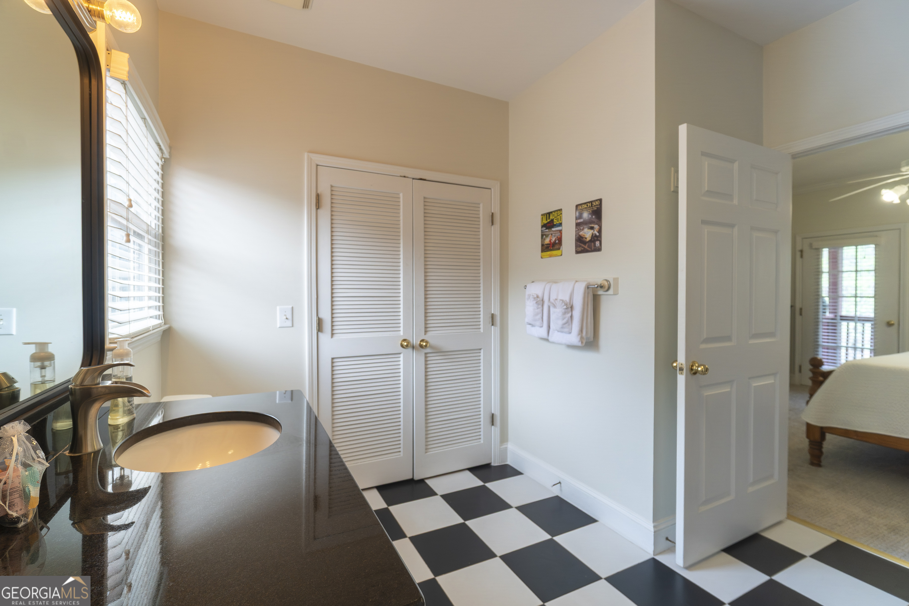 892 Edelweiss Strasse Helen, GA 30545 - Photo 29 of 36 a bathroom with a sink and a mirror