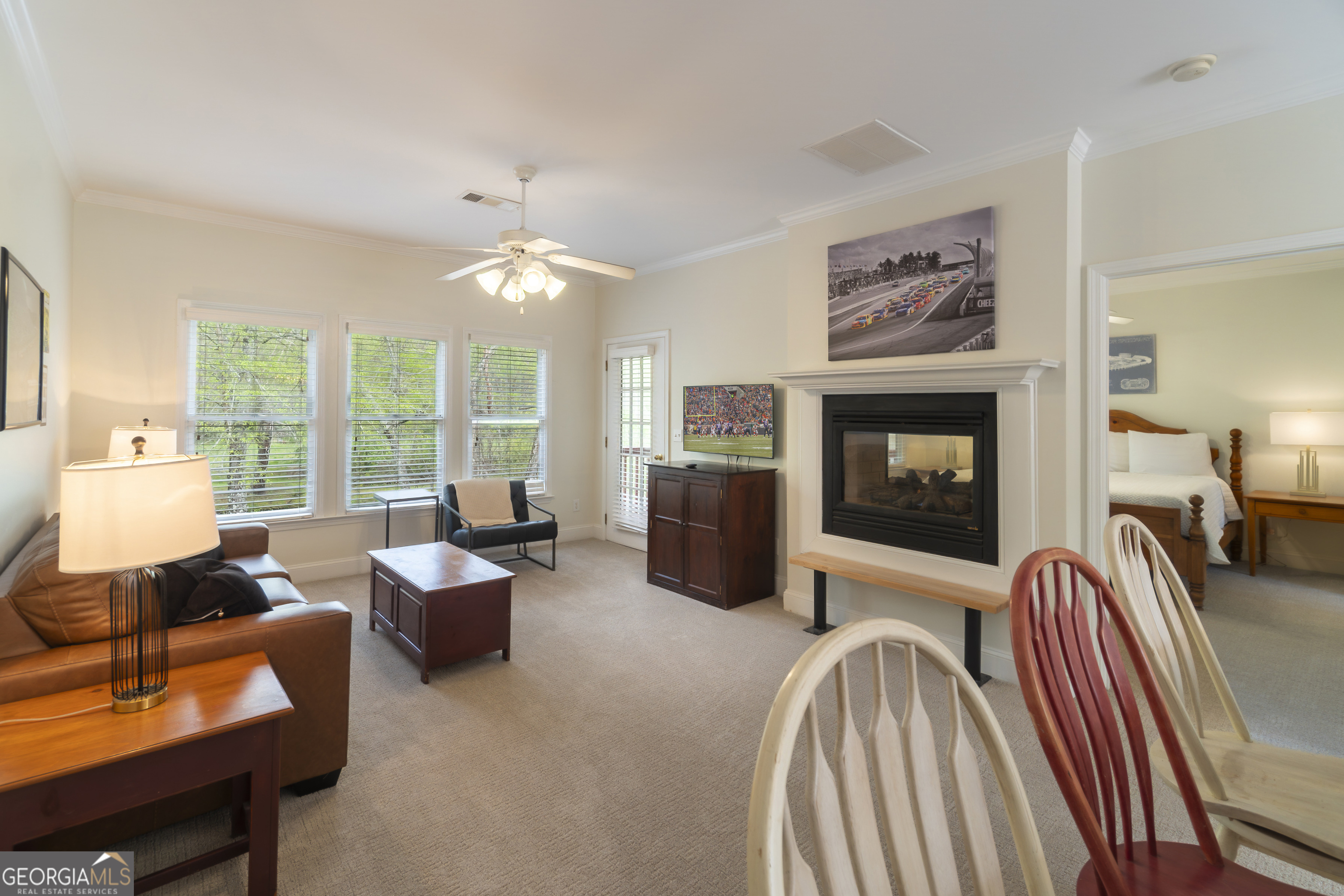 892 Edelweiss Strasse Helen, GA 30545 - Photo 5 of 36 a living room with furniture fireplace and a large window