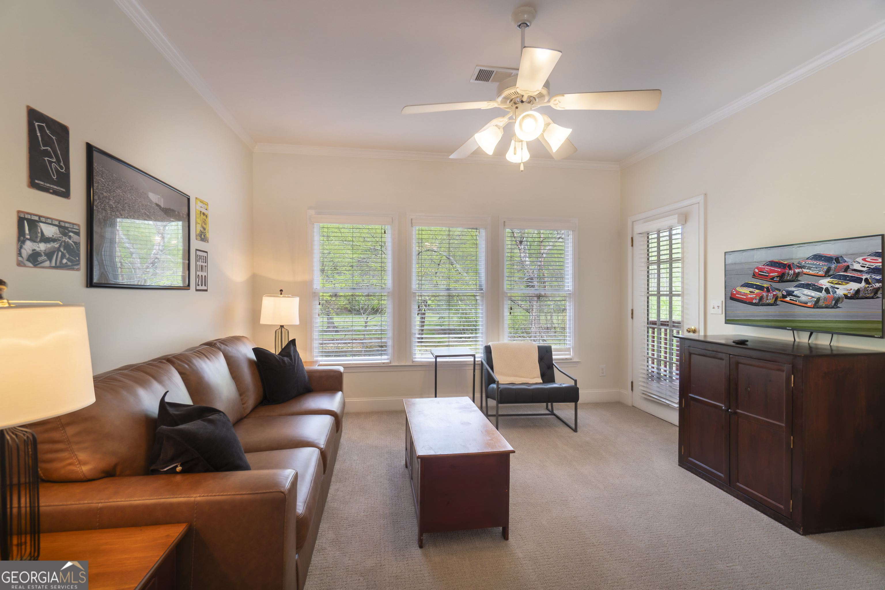 892 Edelweiss Strasse Helen, GA 30545 - Photo 6 of 36 a living room with furniture and a large window