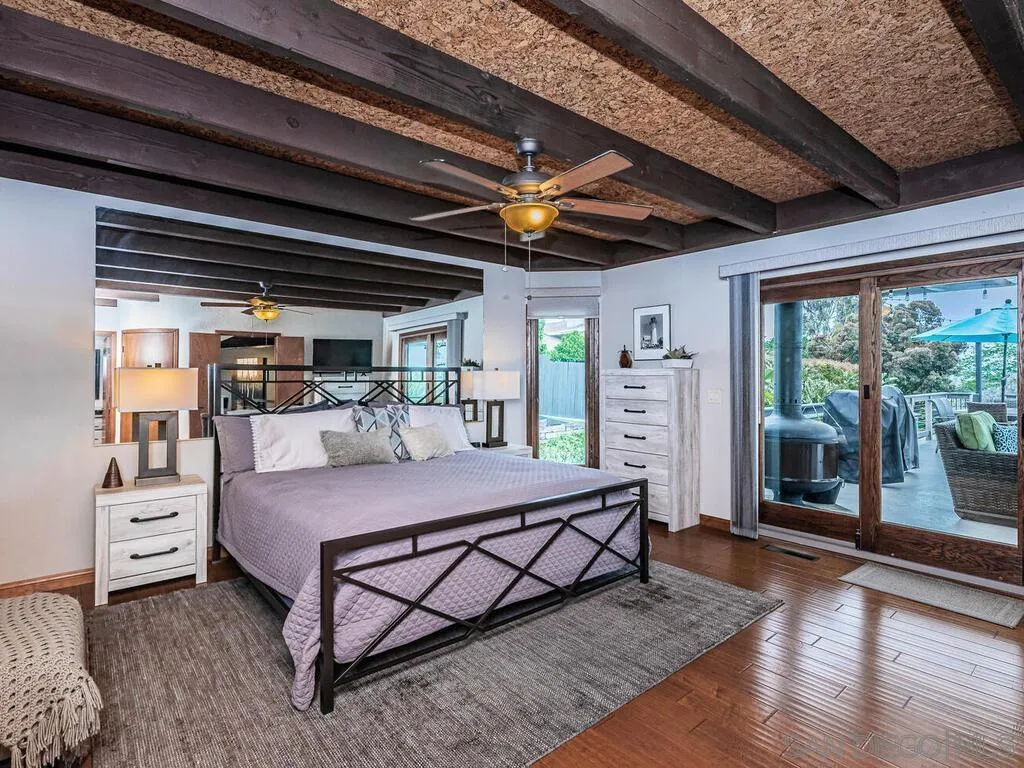 1838 Laurel Road Oceanside, CA 92054 - Photo 25 of 71 a bed room with a bed window and a table