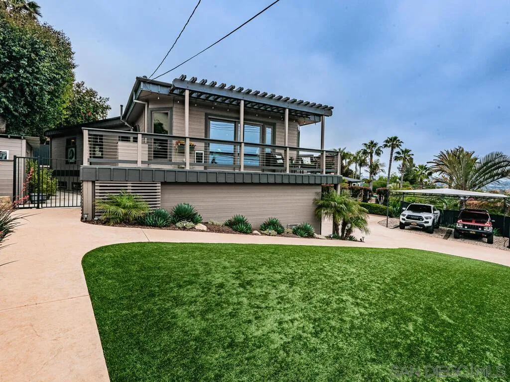 1838 Laurel Road Oceanside, CA 92054 - Photo 30 of 71 a view of a house with a yard patio and sitting area