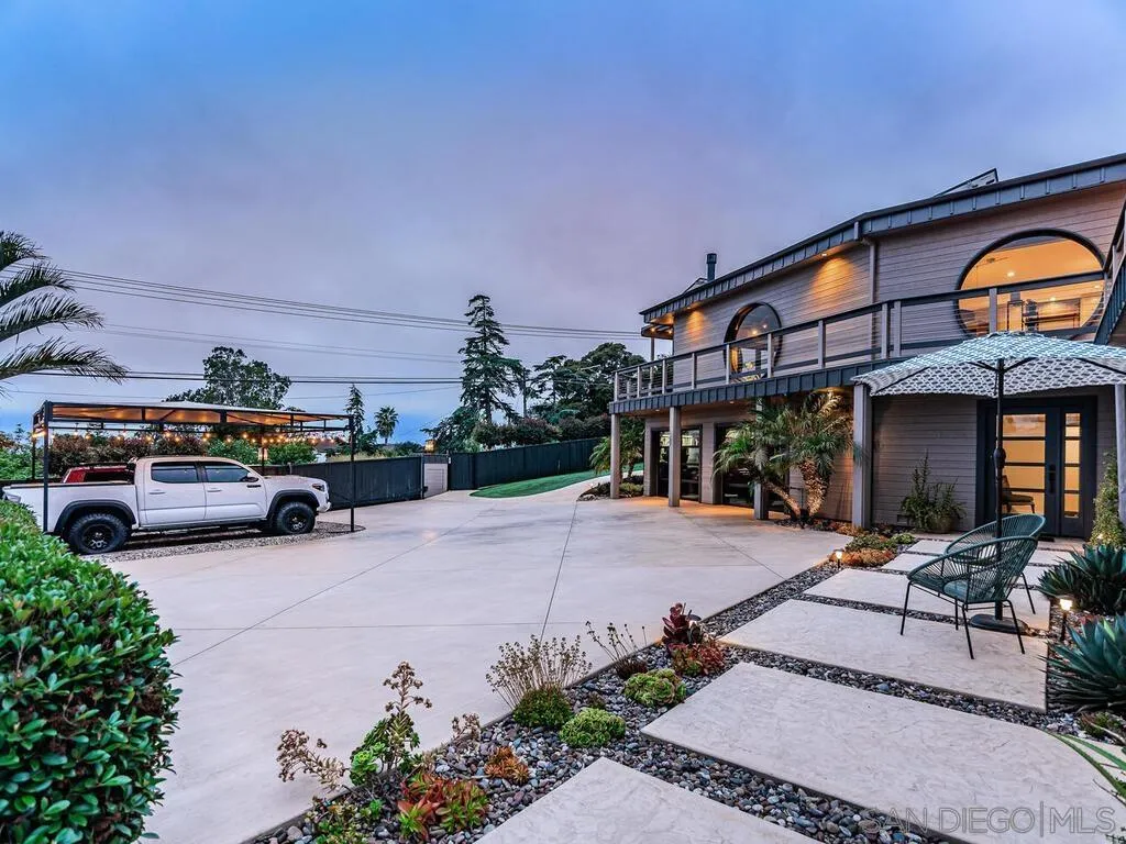 1838 Laurel Road Oceanside, CA 92054 - Photo 32 of 71 a view of a car park in front of house