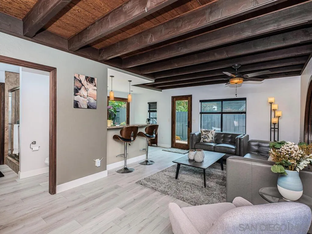 1838 Laurel Road Oceanside, CA 92054 - Photo 35 of 71 a living room with furniture and wooden floor