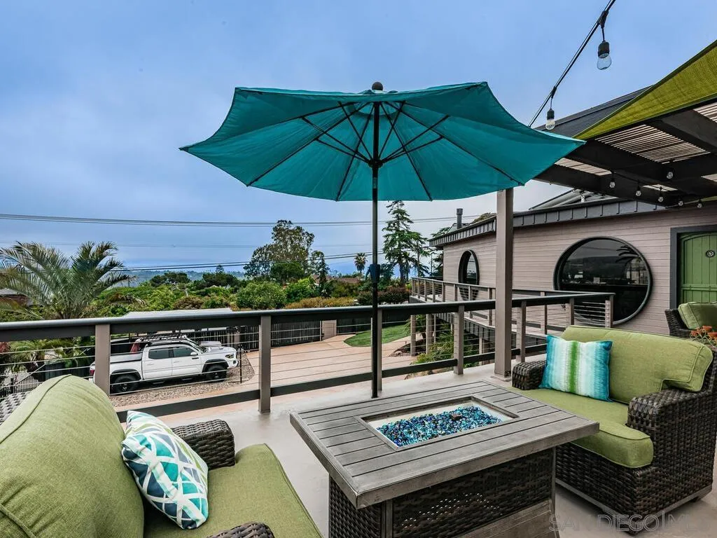 1838 Laurel Road Oceanside, CA 92054 - Photo 54 of 71 a view of a balcony with furniture and a potted plant