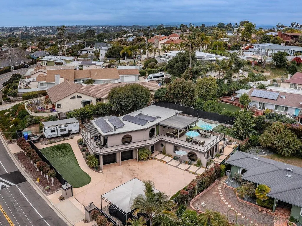 1838 Laurel Road Oceanside, CA 92054 - Photo 67 of 71 an aerial view of multiple houses with a yard