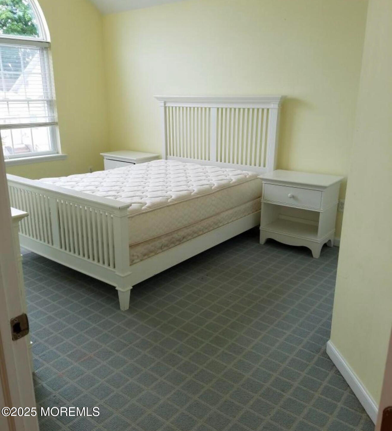 95 Poplar Avenue Deal, NJ 07723 - Photo 8 of 9 a bedroom with a bed and a window