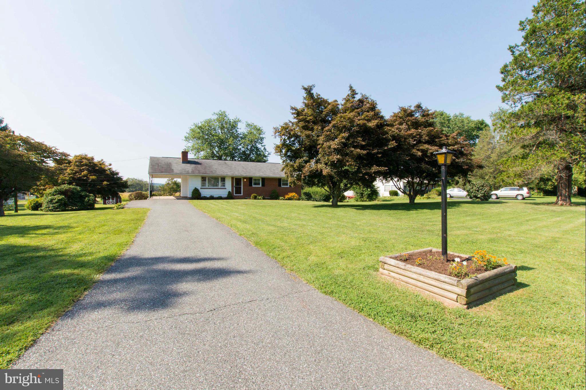 2903 Ashwood Road Fallston, MD 21047 - Photo 2 of 30 a view of a house with a yard porch and sitting area