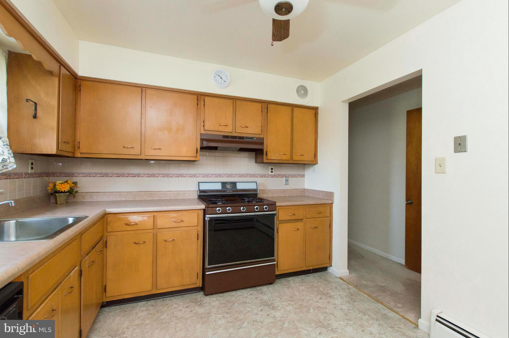 2903 Ashwood Road Fallston, MD 21047 - Photo 13 of 30 a kitchen with stainless steel appliances granite countertop a sink a stove and cabinets
