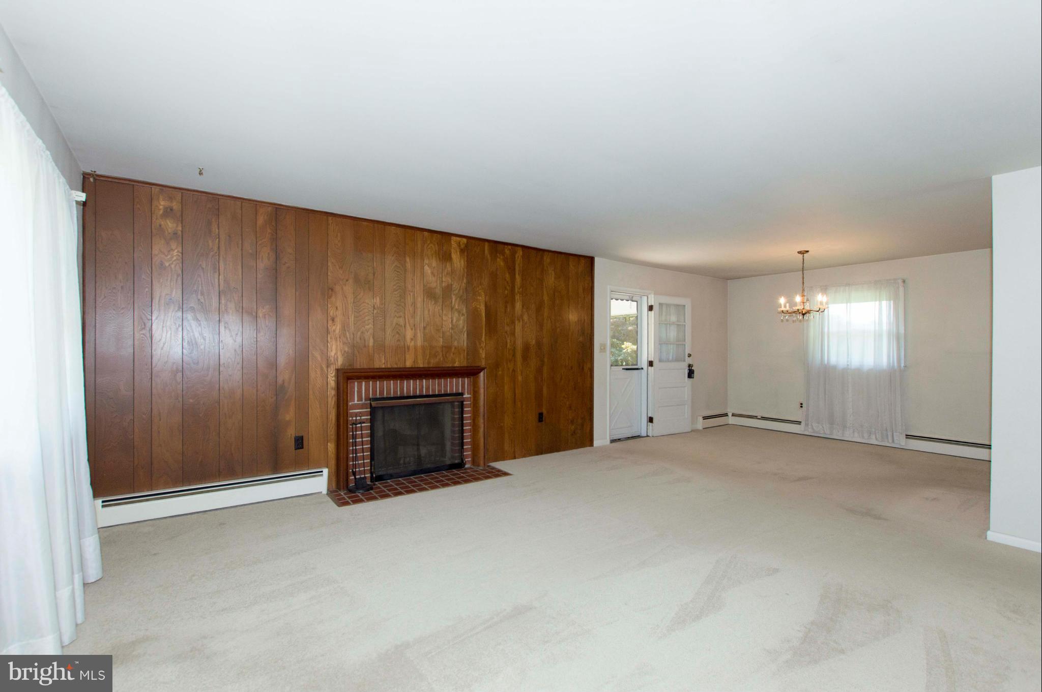 2903 Ashwood Road Fallston, MD 21047 - Photo 6 of 30 an empty room with a fireplace and window