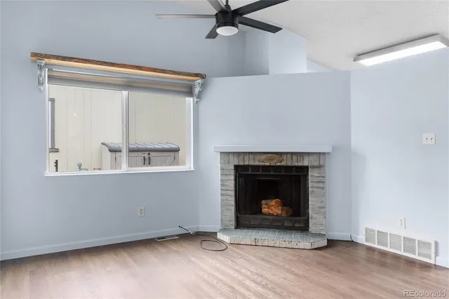 a living room with a fireplace