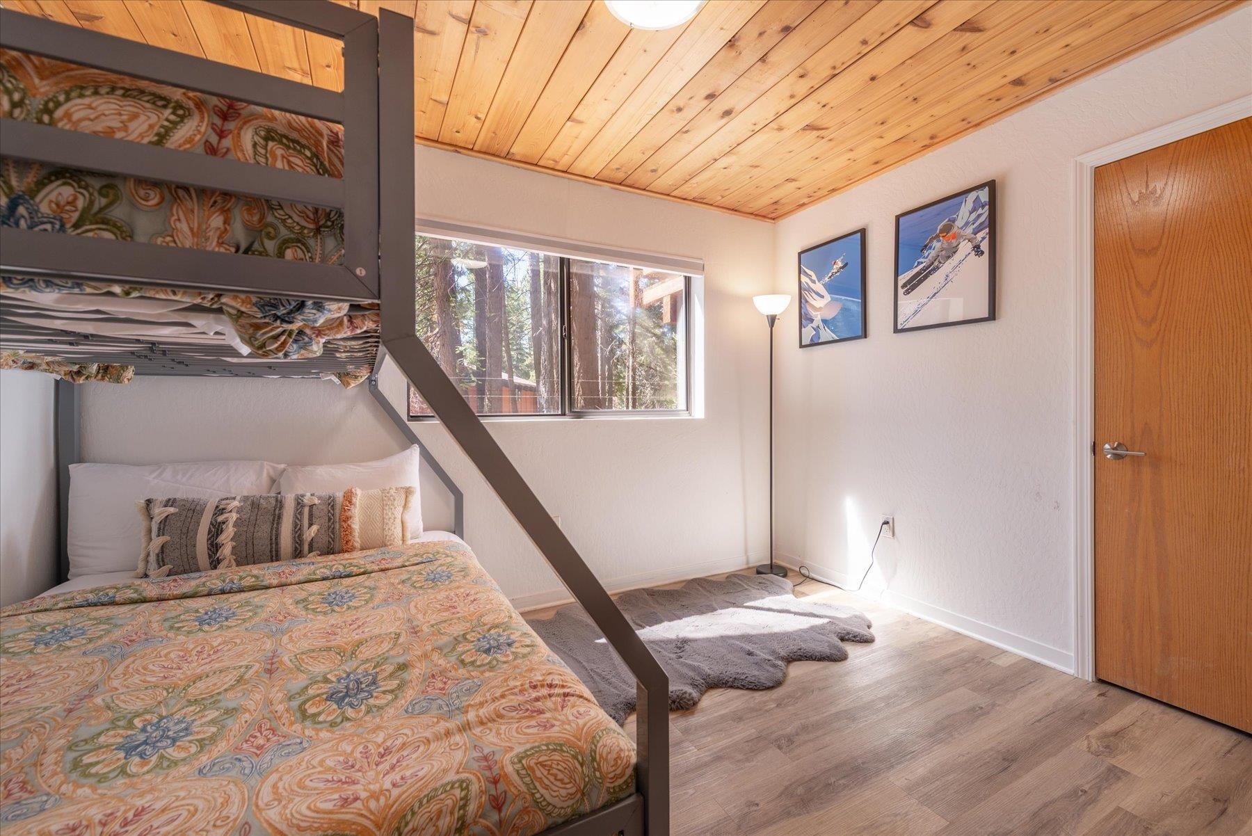 6255 Flicker Avenue Homewood, CA 96141 - Photo 11 of 22 a bedroom with furniture and a window