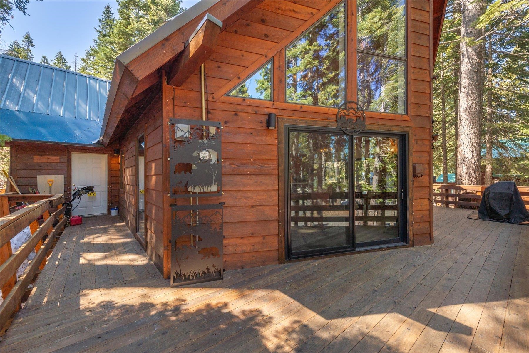 6255 Flicker Avenue Homewood, CA 96141 - Photo 3 of 22 a view of a house with a garage
