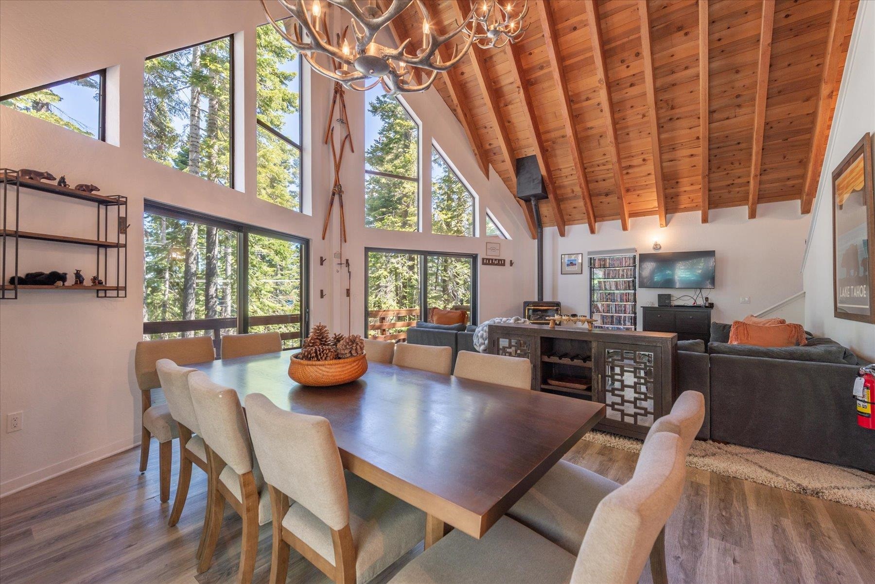 6255 Flicker Avenue Homewood, CA 96141 - Photo 4 of 22 a view of a dining room with furniture window and wooden floor