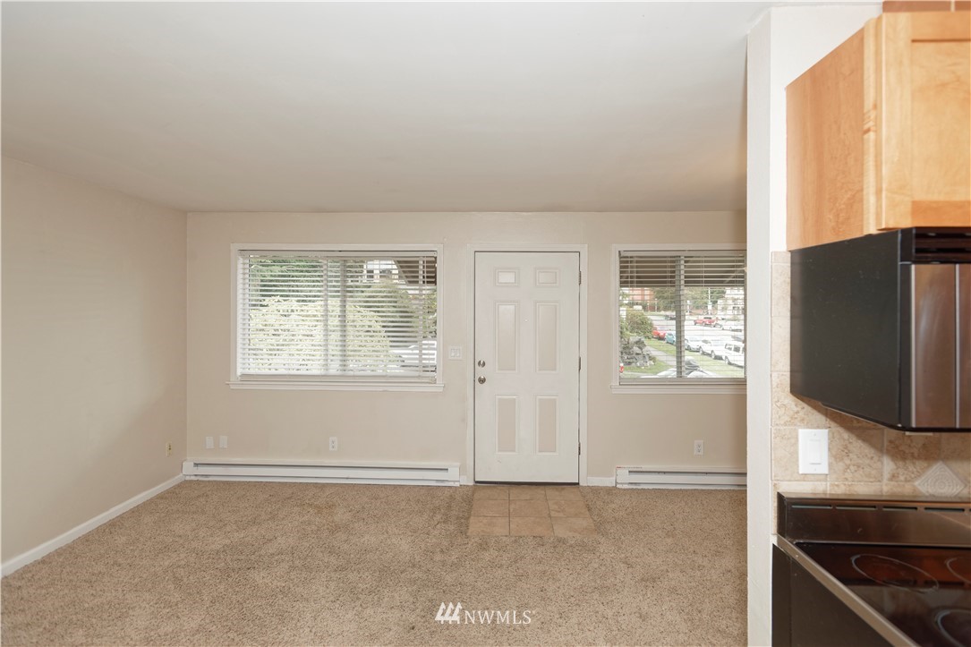 604 North 3rd Street, Unit 7 Tacoma, WA 98403 - Photo 5 of 11 a view of an empty room with a window